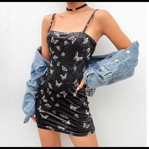 black mini dress with silver butterflies